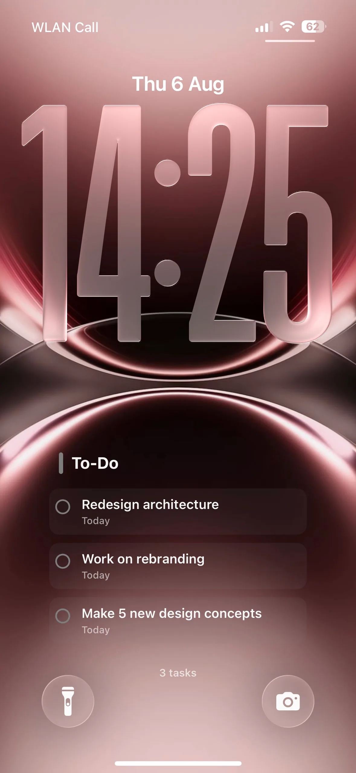 Quartz: Todoist tasks on an iPhone Lock Screen wallpaper